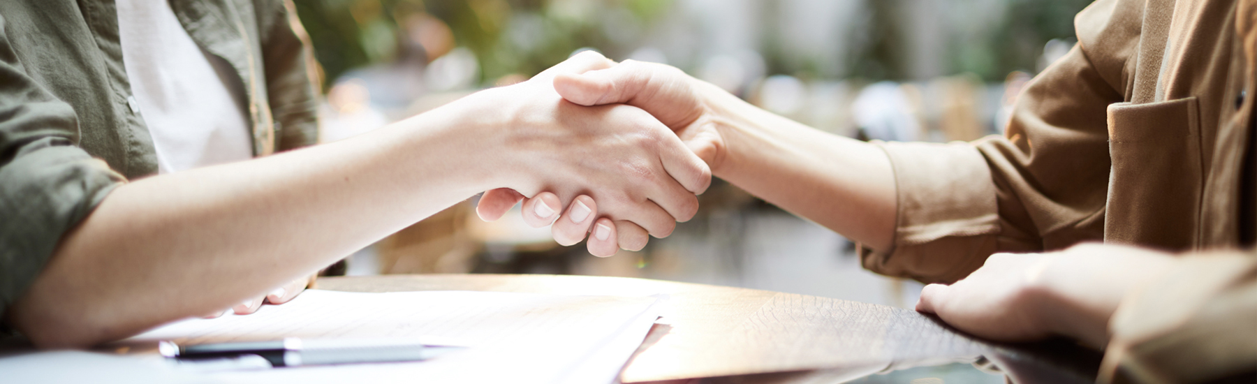 two people shaking hands